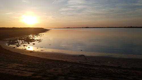 Scenic view of beach during sunset