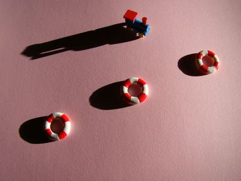 High angle view of multi colored candies on table