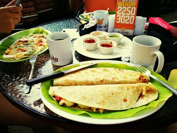 Close-up of served food on table