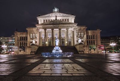 View of fountain in city at night