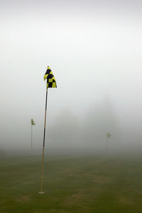 Golf cours in the mist