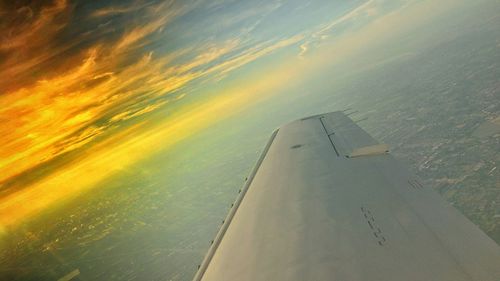 Aerial view of city at sunset