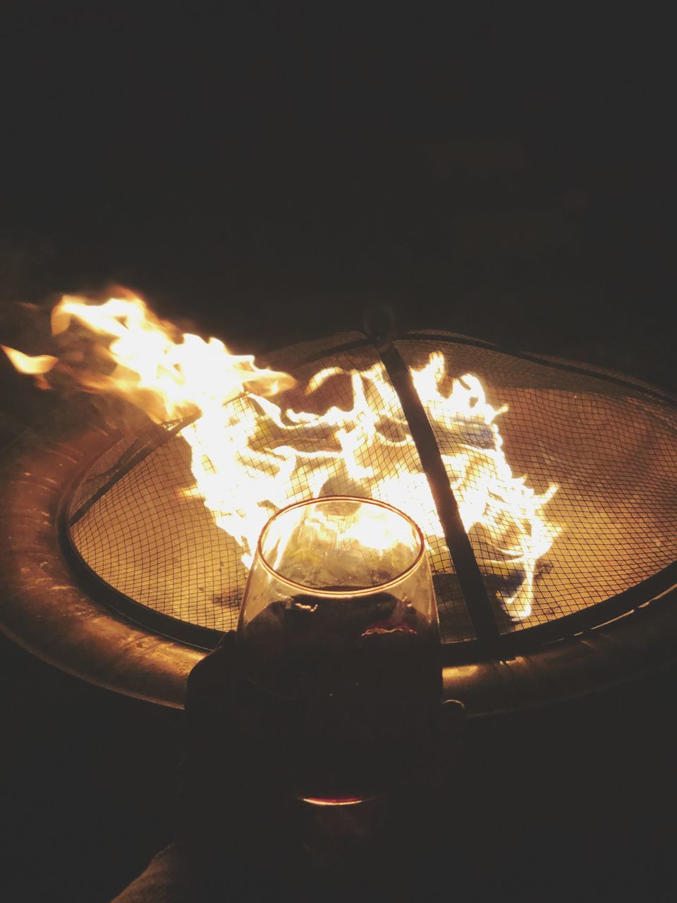 burning, heat - temperature, fire, flame, fire - natural phenomenon, glowing, nature, close-up, food and drink, no people, indoors, food, illuminated, night, motion, high angle view, dark, preparation, lighting equipment, kitchen utensil
