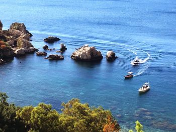 High angle view of sea against blue sky