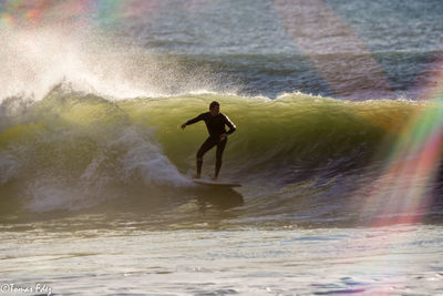 Man surfing in sea