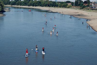 High angle view of people on sea