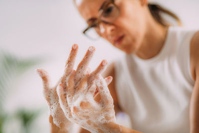 Obsessive compulsive disorder concept. woman obsessively washing her hands.