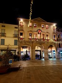 Illuminated building at night