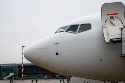 Low angle view of airplane against sky