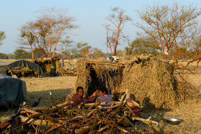 Group of people relaxing on land