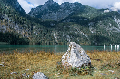 Scenic view of lake against mountain range