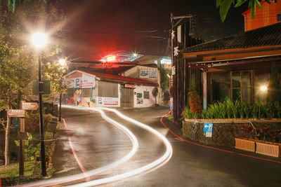 Illuminated street light at night