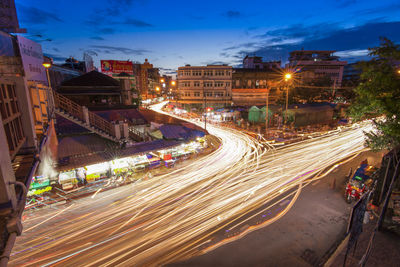 Light trails on city street at night