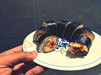 Close-up of hand holding food