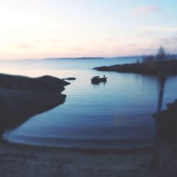 Scenic view of calm sea at sunset