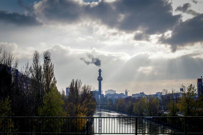 View of city against cloudy sky