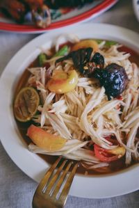 High angle view of pasta in plate on table