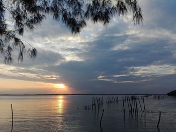 Scenic view of sea against sky at sunset