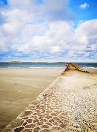 Scenic view of beach against sky