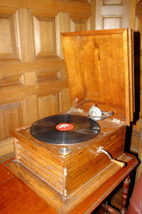 Close-up of wooden table at home