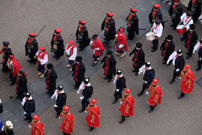 High angle view of band marching on street