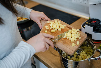 Midsection of woman holding food