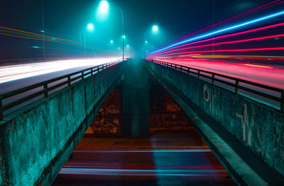 Light trails on illuminated city at night