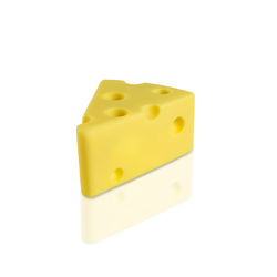Close-up of yellow cake against white background