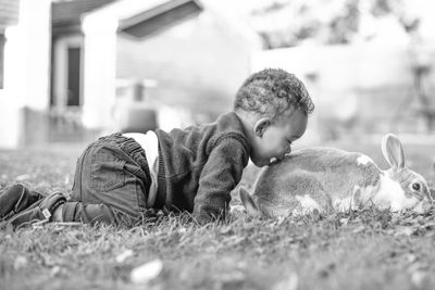 Portrait of boy relaxing outdoors