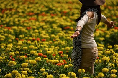 Woman hand holding flowers