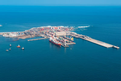 High angle view of sea against blue sky