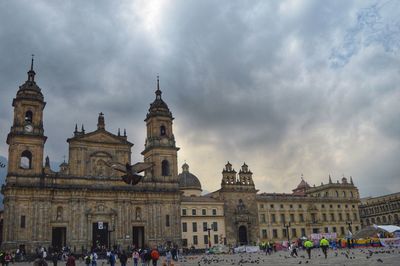 Group of people in front of historical building