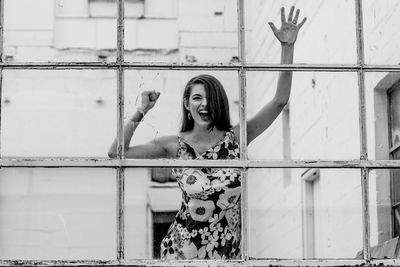 Trapped woman screaming seen through window