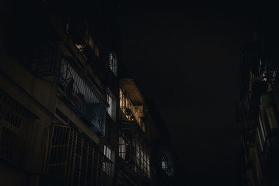 Illuminated buildings in city at night