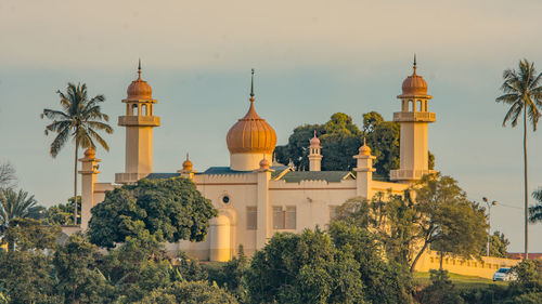 View of cathedral and buildings against sky