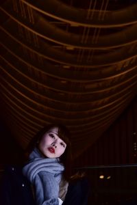 Portrait of beautiful woman standing indoors