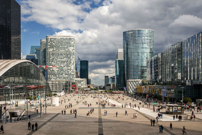 Modern buildings in city against sky