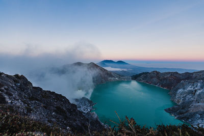 High angle view of volcanic mountain against sky