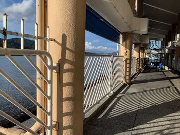 Bridge over sea against sky in city