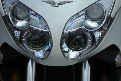 Close-up of motorcycle headlights