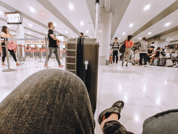 Group of people waiting at airport