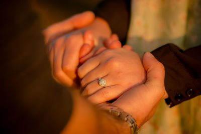 Midsection of woman with hands