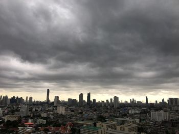 Modern buildings against sky in city