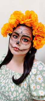 Portrait of young woman wearing mask