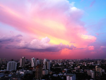 High angle view of buildings against sky during sunset