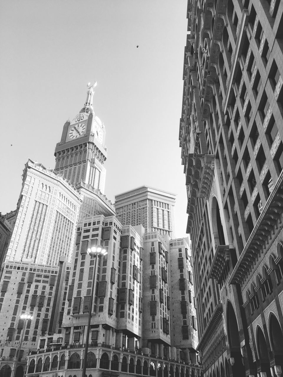 architecture, building exterior, built structure, low angle view, skyscraper, city, outdoors, no people, clear sky, sky, day, cityscape