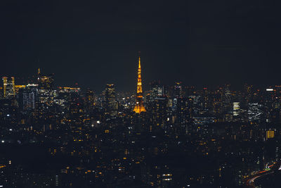 Illuminated buildings in city at night