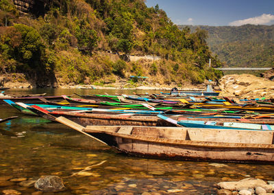 Fishing boat many at river shore at morning from flat angle