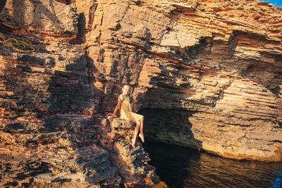 Shadow of man on rock formation