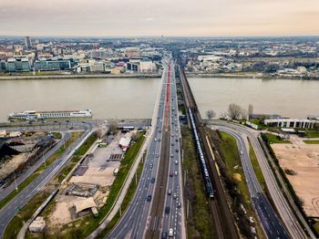 High angle view of highway by river in city